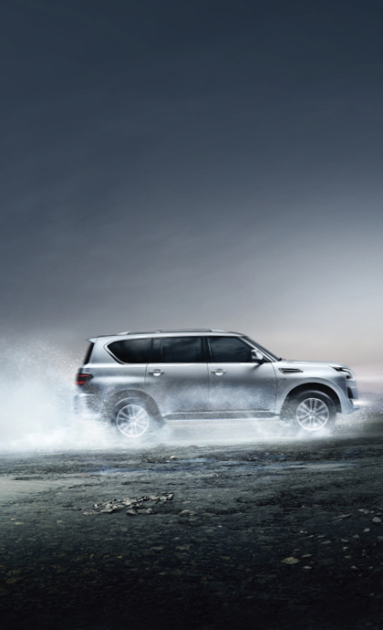 Silver Patrol Y62 driving through wetlands 